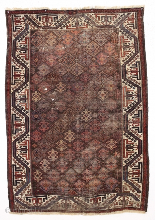 antique baluch rug with an interesting archaic waisted diamond lattice design. Colorful ivory ground turkman line border. As found, very very dirty with scattered old damage and wear as shown. Interesting study  ...