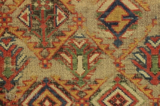 early caucasian kuba long rug. Superb color and unusually varied and delicate drawing. I don't think I've ever seen this much variety of elements in a similiar rug. Heavily oxidized brown ground  ...