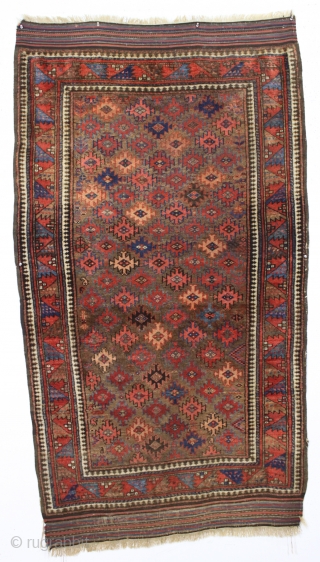 antique very colorful baluch rug with an attractive design featuring a very nice border. Overall mostly very good pile with just a bit of scattered light wear. I see one dime size  ...