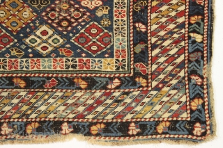 Antique little caucasian prayer rug, probabaly kuba area, with a fascinating field design and an interesting main border. I have never had a rug with this field design. Overall fair condition with  ...