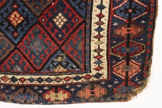 antique complete connected pair of kurdish bags with an unusual ashik gul border. Mostly good pile with a few spots of wear and edge roughnes. All natural colors featuring a nice aubergine,  ...