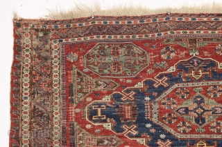 antique small soumak carpet. Classic design with some charming tribal elements including 12 rockects and 6 tiny people. Nice older example in good condition for the age. All natural colors featuring a  ...