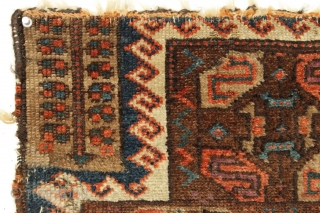 Antique baluch rug fragment. Rare design. All good natural colors. Edge damage all around, small old repairs, moth nibbles, small tears. Just had a quick wash. Good age, ca. 1880 or earlier.19"  ...