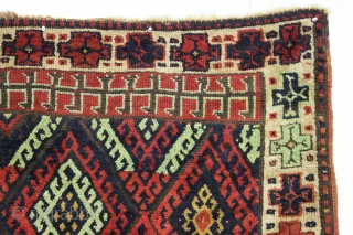 antique kurdish rug with classic diamond design field and some unusual features. Interesting quirky designs added to either end of the field and unusual very light green pile. This very light green  ...