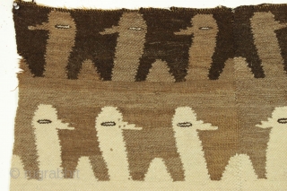 Old textile fragment. South American? They look like alpacas and probably it's alpaca wool. Woven in two pieces. Original selvages. Reasonably clean. Soft and charming. 2'7" x 3'     