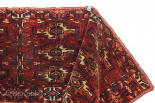 antique little turkoman torba or mafrash, probably tekke, with good pile, silky wool and fine weave. A few knots of magenta silk in gul centers. Delicate drawing and an attractive border. Allover  ...