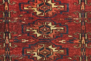 antique little turkoman torba or mafrash, probably tekke, with good pile, silky wool and fine weave. A few knots of magenta silk in gul centers. Delicate drawing and an attractive border. Allover  ...