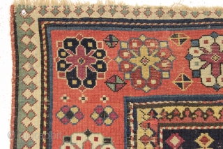 Antique caucasian rug. Early example in abused condition. An interesting design with all natural colors (no fuchsine). Grandma worked overtime flat stitching this beauty, filling in substantial sections by candlelight no doubt.  ...