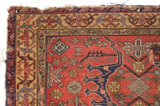 Antique interesting persian village rug. Very dynamic drawing and first rate colors. Mostly fair pile but with damage as shown. "as found" and in need of a good wash. Ca. 1875, probably  ...