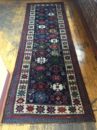 Antique runner with a terrific field design and an even better border. Caucasian? Shahsavsn? Beautiful colors featuring lovely greens and strong clear yellows. Washed and restored to near original condition. Not something  ...