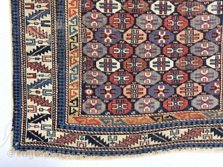 Colorful antique Caucasian rug in fair condition for the age. Probably shirvan. Uncommon all over “tile” design. Low pile with some areas of foundation showing. Priced accordingly. Thin and pliable. Minor edge  ...