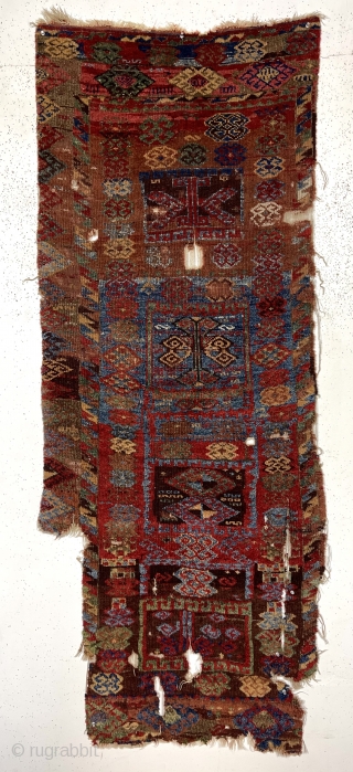 Early east Anatolian Kurdish pile rug fragment. Splendid natural colors with saturation rarely found outside these beautiful weavings. Good fleecy pile with scattered wear, holes, tears and brown oxidation. Edges unraveling. Remnant  ...