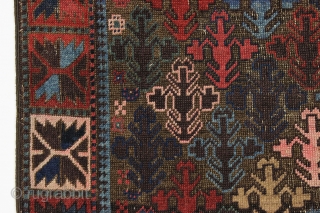 Antique baluch rug. Interesting design. Turkish knotted. Rough condition. Beautiful blues, greens, strong reds, some camel wool, and typical eye opening pinks. late 19th c. 3'2" x 4'9"     