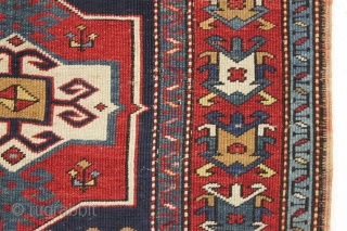 antique small kazak prayer rug. Unusual field ornamentation and a striking light blue border. If palmettes are your thing this is the rug for you. All natural colors including an unusual yellow/gold.  ...