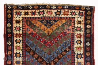 antique kurdish rug in good condition with a bold design and superb colors. Genuine old rug from a New England home. Overall fleecy wool and thick good pile with only slight wear.  ...
