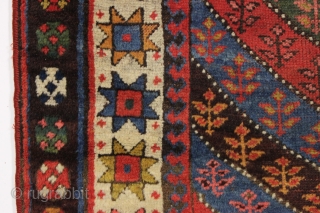 antique kurdish rug in good condition with a bold design and superb colors. Genuine old rug from a New England home. Overall fleecy wool and thick good pile with only slight wear.  ...