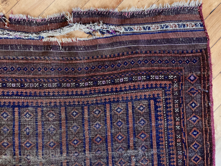 Antique little Baluch rug with an unusual, perhaps unique design. Has wear and small damages. Time to empty the cedar chests. 19th c. 3’7” x 5’5”       