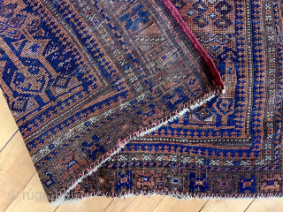 Antique little Baluch rug with an unusual, perhaps unique design. Has wear and small damages. Time to empty the cedar chests. 19th c. 3’7” x 5’5”       