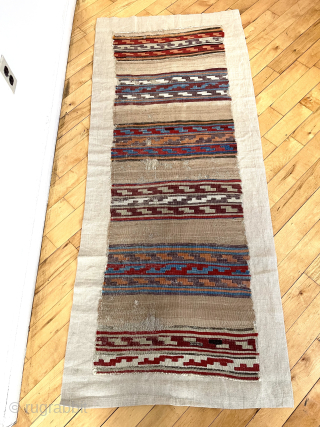 Early Anatolian kelim fragment. Attractive striped design. Sewn onto cloth backing. Lovely old colors. Mid 19th c. or earlier. Kelim  22” x  68” waynecbarron@aol.com       