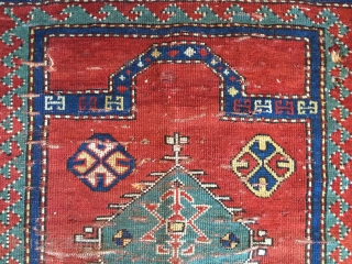 Early very small Kazak prayer rug. spacious drawing and rich saturated natural colors. As found, dirty with wear, holes, old moth damage, end loss. Storage clean out price. Good age, 3rd qtr.  ...