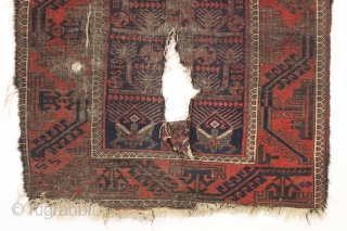 antique small baluch rug with interesting design features. Another piece from a local Boston home. In very rough condition but with some powerful archaic elements. Wear and damage clearly shown. Priced accordingly.  ...
