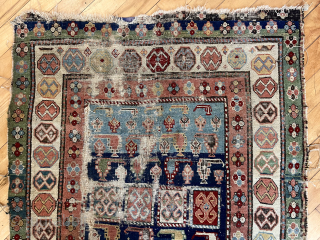 Out of the cedar chests. Early Caucasian rug with uncommon field. Great old colors. Truly non commercial. What Brim used to deliver. Not perfect condition. First half 19th c. 3’6” x 6’9” 