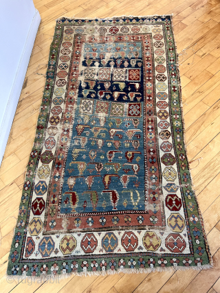 Out of the cedar chests. Early Caucasian rug with uncommon field. Great old colors. Truly non commercial. What Brim used to deliver. Not perfect condition. First half 19th c. 3’6” x 6’9” 