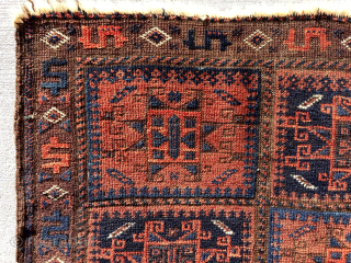  Out of the cedar chests. Baluch bagface with rare field and great “money” border.   First rate colors with the best ember reds. Overall pretty good condition. A gem. 19th  ...