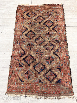 Out of the cedar chests. Lovely older Baluch rug with uncommon design and vivid electric light blues. Soft cloth like handle. Turkish knotted. Not perfect condition. 19th c. 37” x 65”  