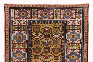 antique yellow ground caucasian gendge rug. Nicely drawn large tulip palmettes and an unusually colorful kufic border. Overall good condition with even medium pile. All natural colors including nice greens, light blues,  ...