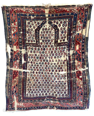 Out of the cedar chests. Early ivory ground prayer rug. Uncommon design with intricate tiny boteh. A “mini marasali”. Fine weave and great color. Not perfect condition. Good age. First half 19th  ...