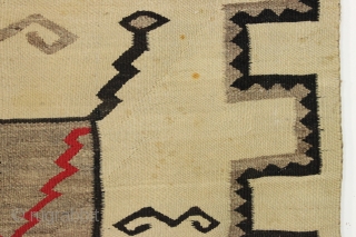 Older navajo rug with storm design. "as found", very dirty and with a good hole. Nice tight weave. No dye run. late 19th c. 3'6" x 5'7"      