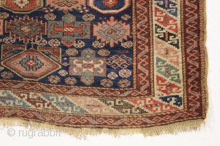 antique seichour kuba rug. Active and interesting field design. Fresh New England rug. All natural colors. As found, very very dirty with some wear, very small hole as shown. Original selvages. Couple  ...