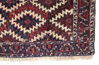 antique nascent or fragmentary turkoman asmalyk with an unusual border. Appears to have all natural dyes and an interesting and unusual palette. Various old small crude repairs and of course the big  ...