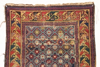 antique very small caucasian shirvan rug with an unusual design and a lovely yellow border. Very fine weave. Supple, cloth like handle. As found, with mostly even tight pile, some scattered wear  ...