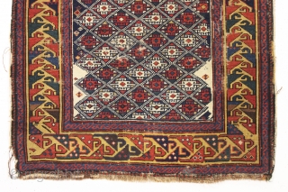 antique very small caucasian shirvan rug with an unusual design and a lovely yellow border. Very fine weave. Supple, cloth like handle. As found, with mostly even tight pile, some scattered wear  ...