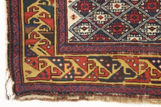 antique very small caucasian shirvan rug with an unusual design and a lovely yellow border. Very fine weave. Supple, cloth like handle. As found, with mostly even tight pile, some scattered wear  ...