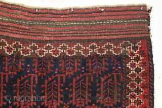 antique baluch rug with an unusual and attractive border. As found, overall mostly decent pile, scattered wear as shown. All good natural colors. Remnant original selvages and fancy long kelim ends. Reasonably  ...