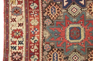 antique caucasian rug, probably kuba, with bold lesghi stars and the complex drawing that indicates good age. As found, mostly good pile elements on a very corroded brown ground. Some scattered damage  ...