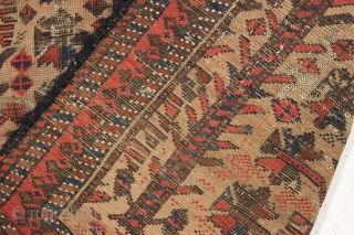 antique little camel ground baluch rug with tree elements and some unusual red dotting. I've never seen this before. Unfortunately this rug ran into a buzz saw and is nearly cut in  ...