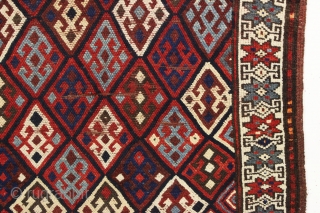 Antique tribal mystery rug. Charming little rug with a kurdish type diamond lattice design, complete with offset knotting in the field area. The overall color palette appears more veramin or luri to  ...