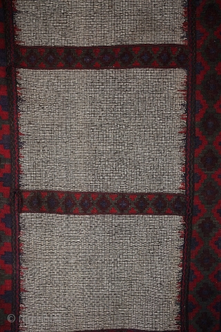 C141. Long sofre. Collected Afghanistan, but unknown origin. The field weave is unique - we've never seen it before. The border could be north or south Afghanistan. Mostly warp wrap kilim, but  ...