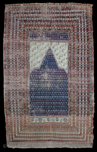 Anatolian Prayer rug,W/W,210X145 cm. Two unusually large fragments sewn together before the selvages were fixed. Former turkish owner attributed it to Gördes, but a unique design like this does not fit into  ...