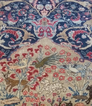 Persian Dragon rug, 187/145 cm.,19thC.Attributable either to Kirman(Kerman) because of the deep'Bordeaux'red, or to Isfahan because of the dragon and animal phantasies. This thin and exquisite rug has survived well due to  ...
