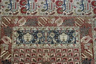 Gördes Prayer Rug. C.1900, or early 20th.cent. 135x185 cm. Full pile, typical Gördes coloring. Classical but very intricate borders. One minimal repair at selvages. Several small damaged spots within the Mihrab, difficult  ...