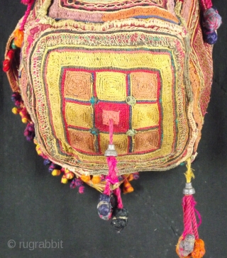 Pretty Banjara embroidered four sided tasseled wedding bag from Karnataka. C1930
Nice quality stitching with signs of age and a small worn patch on one panel , each side panel measures 12cm wide  ...