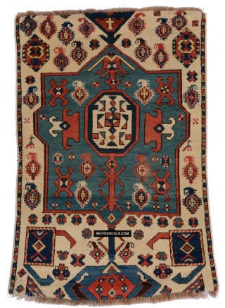 Exquisite boteh & birds on an old Kazak fragment. High pile, good colors. Ends missing. Enjoy more photos and description here: https://wovensouls.com/products/1718-antique-white-field-kazak-village-rug-with-birds-boteh

           