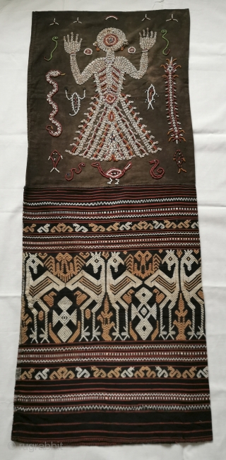 Superb Old Sumba Ceremonial Weaving with Shells & Beads called Lau Wuti Kau. Exceptional layout and attention to detail. See more here https://wovensouls.com/products/1144-old-sumba-ceremonial-skirt-weaving-with-shells-beads-lau-wuti-kau 
Enjoy the visual feast!      