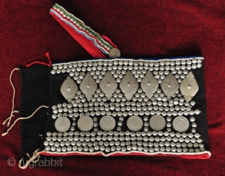 Vintage Indigo Akha Breast Cloth with Tin Embellishments. See more here: https://wovensouls.com/products/309-antique-costume-textiles-akha-blouse                     