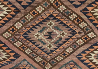 A large old east Afghan tent kilim. Hand spun dyed brown/purple sheep wool in the field/background with some abrash and natural white wool and I a combination of natural and synthetic dyes  ...